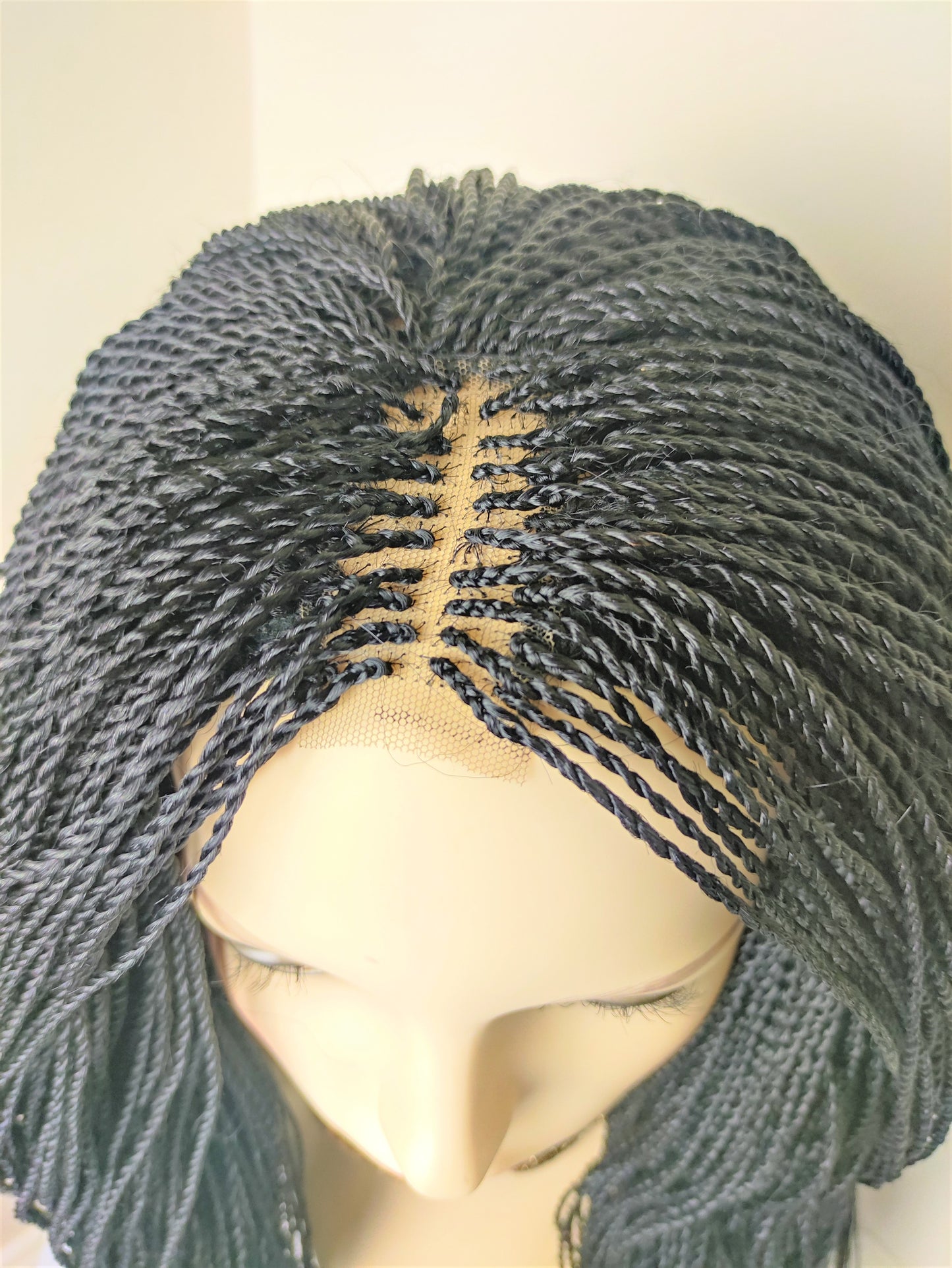 Black twist braids wig.